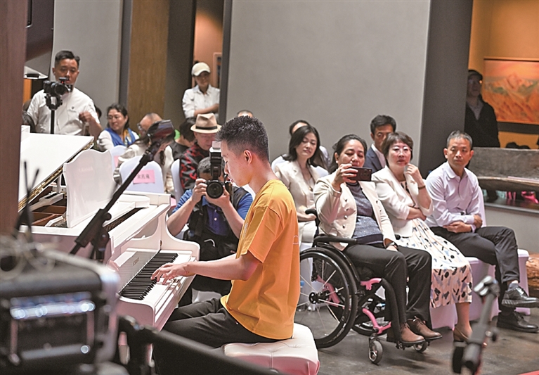 球盟会入口：保障水平更高 发展能力更好——“十四五”时期我国残疾人事业迈出坚实步伐(图1)