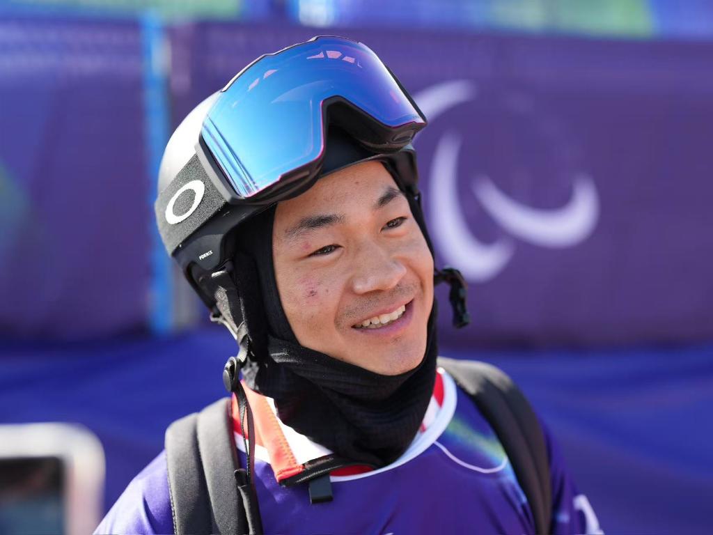 越坚持越幸运——记米兰冬残奥会残奥单板滑雪冠军武中伟(图2)